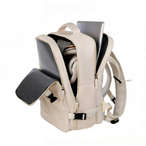 Sac à dos crème ouvert, avec compartiments de rangement et poche pour ordinateur
