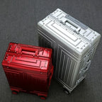Valise à roulettes argentée — alliage aluminium-magnésium